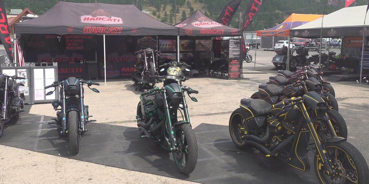 Vendor displays unique European style motorcycles at rally