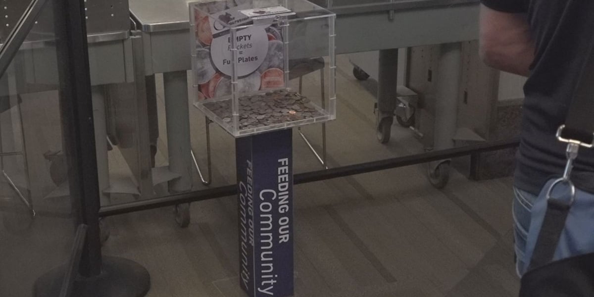 Travelers donate spare change for the less fortunate