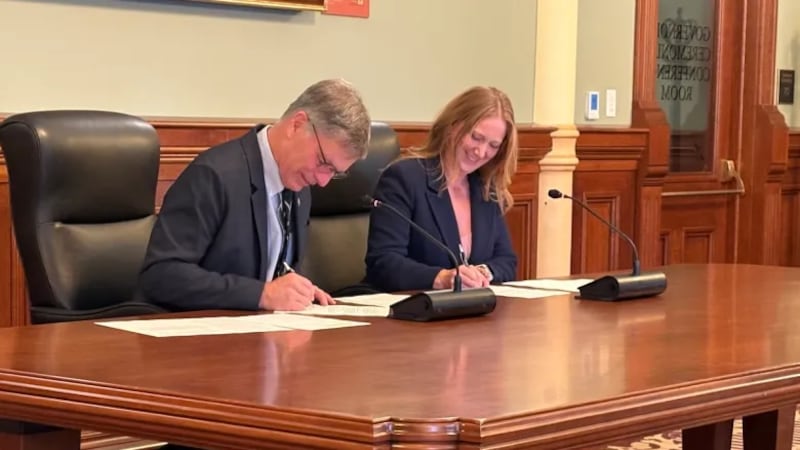 Gov. Mark Gordon and Federal Permitting Improvement Steering Council Executive Director Emily...